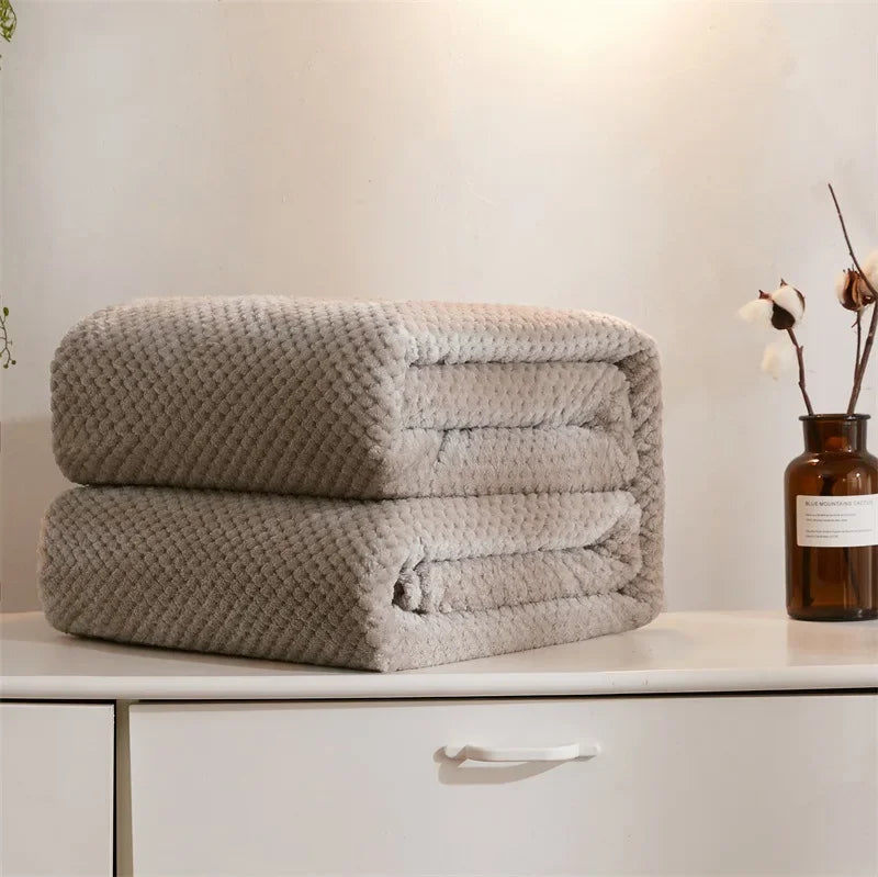 Couverture bébé corail Nuitara — enveloppant bébé, chaleur sécurisante